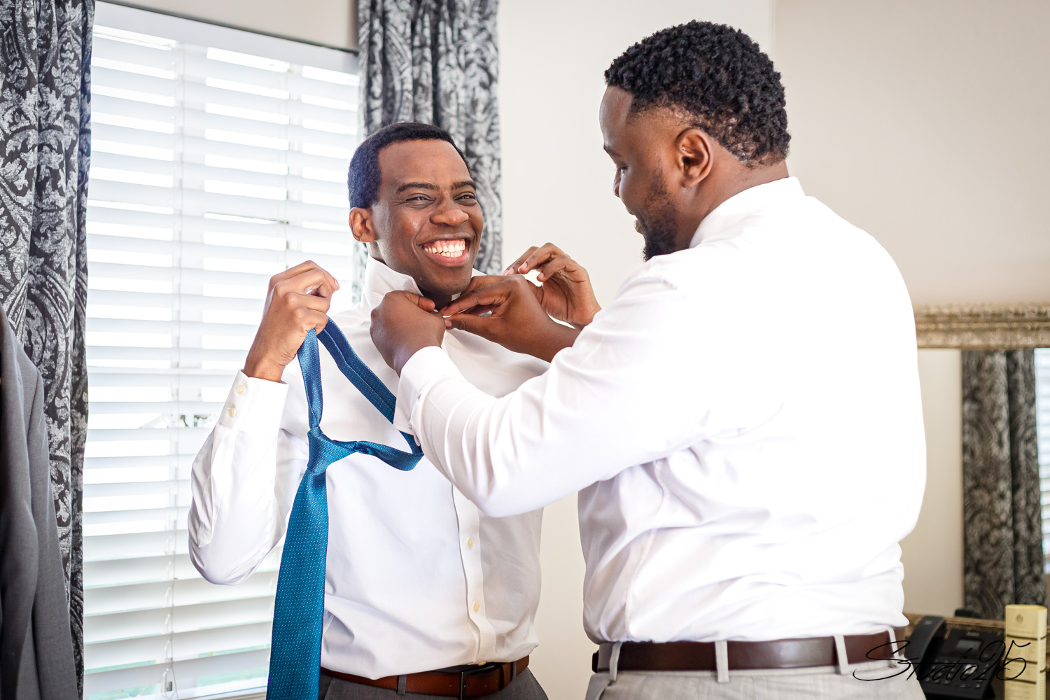 Bride and groom embrace during a South African wedding ceremony, timed perfectly for stunning portraits.